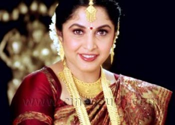 Ramya Krishna as Meenakshi