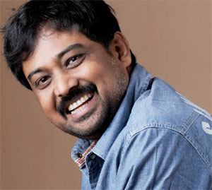 Tamil Director Vying for Telugu Heroes