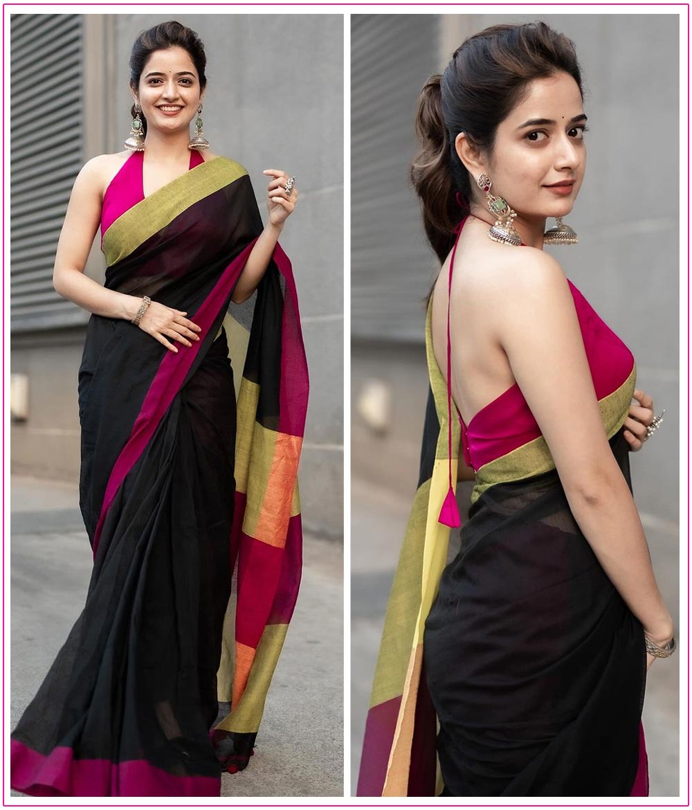 Ashika looks stunning in a classic black saree 