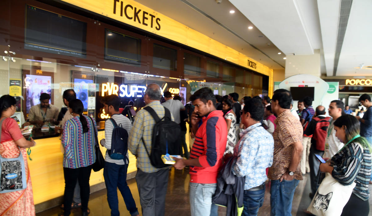 Movie buffs at ticket counter
