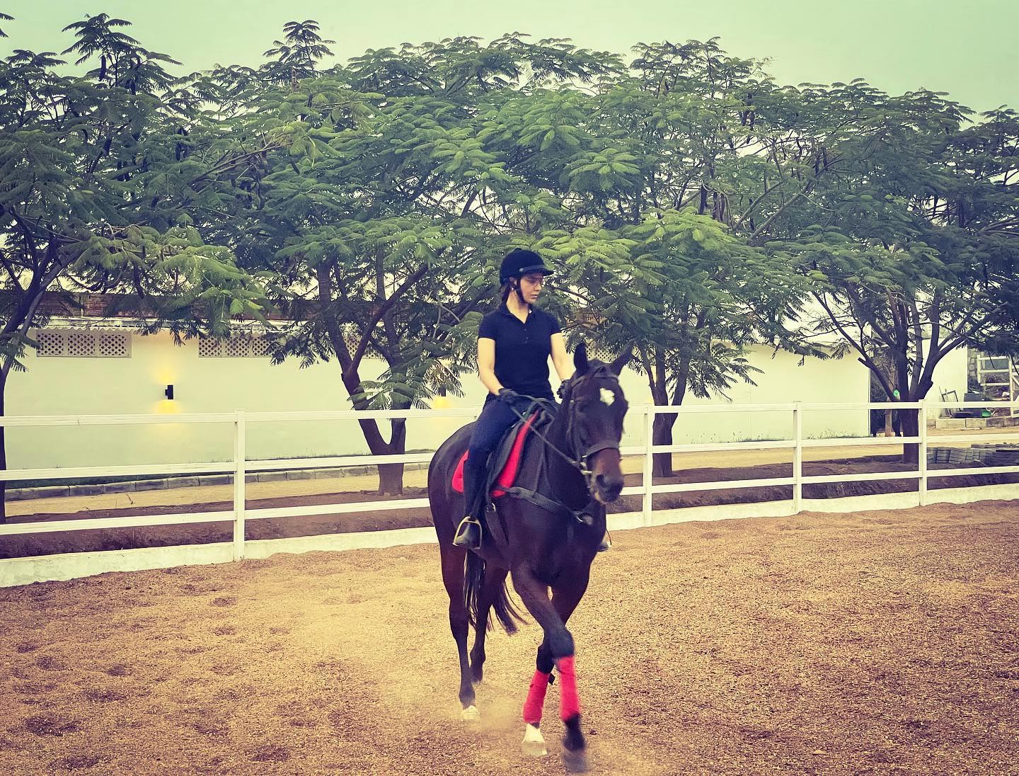  Samantha rides black beauty