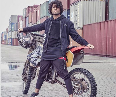Vijay Devarakonda turning bike racer