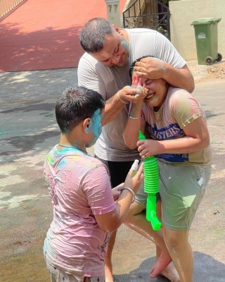 Anasuya Celebrates Holi with her Family - 6 of 8