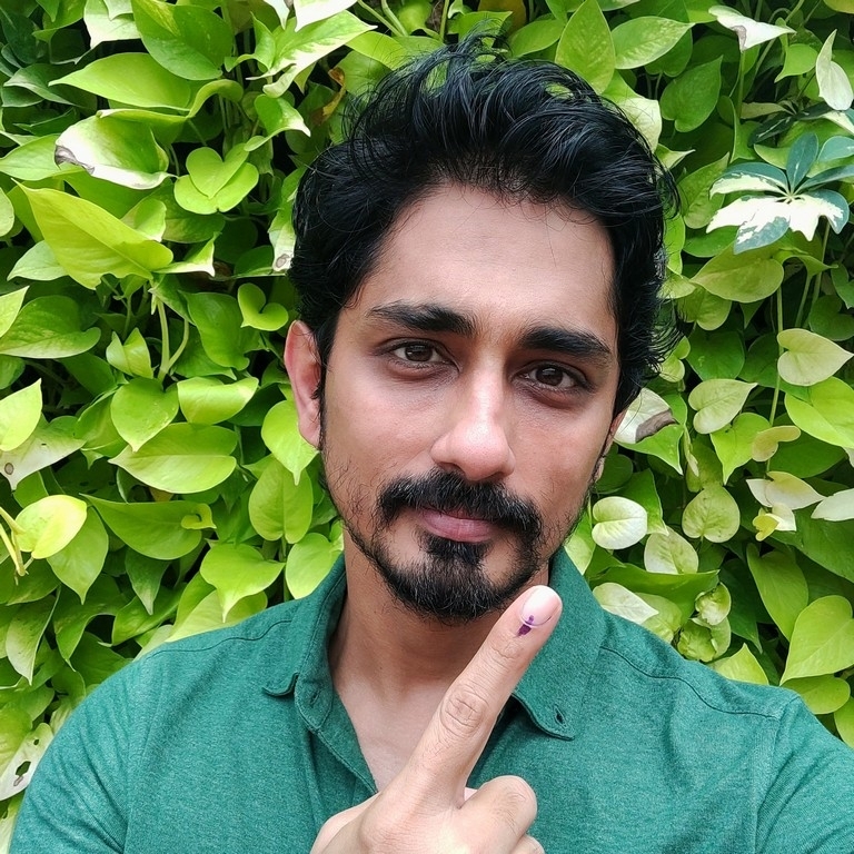 Celebrities casting vote in TN Elections - 27 / 35 photos