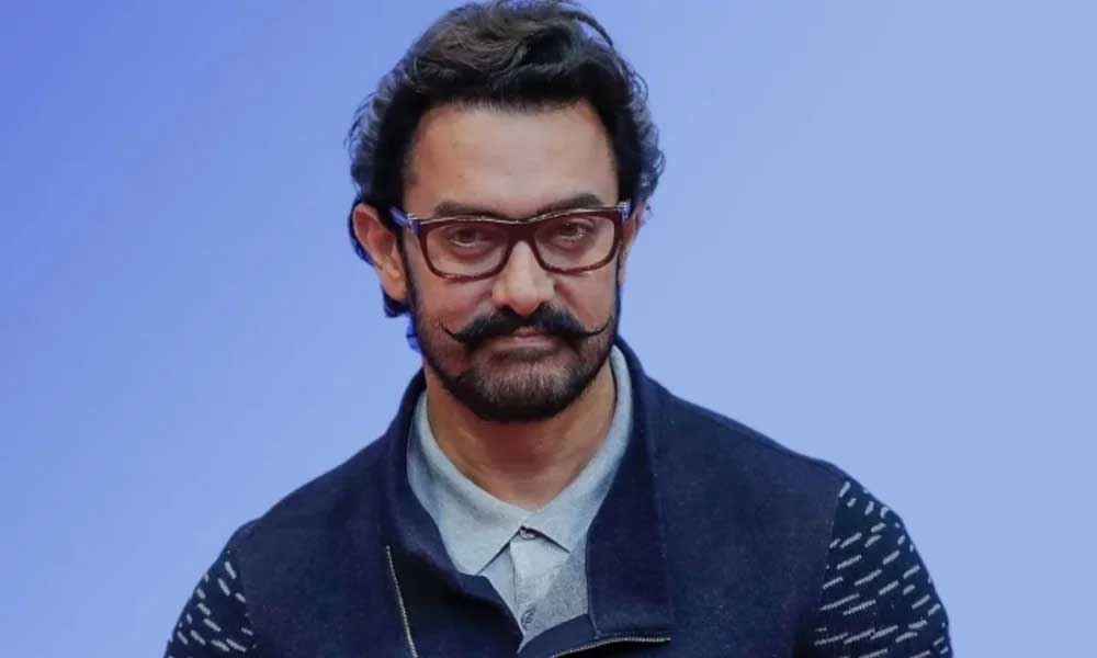 aamir khan  మొండిత‌నంతో రిలీజ్ ఆపుకున్న హీరో