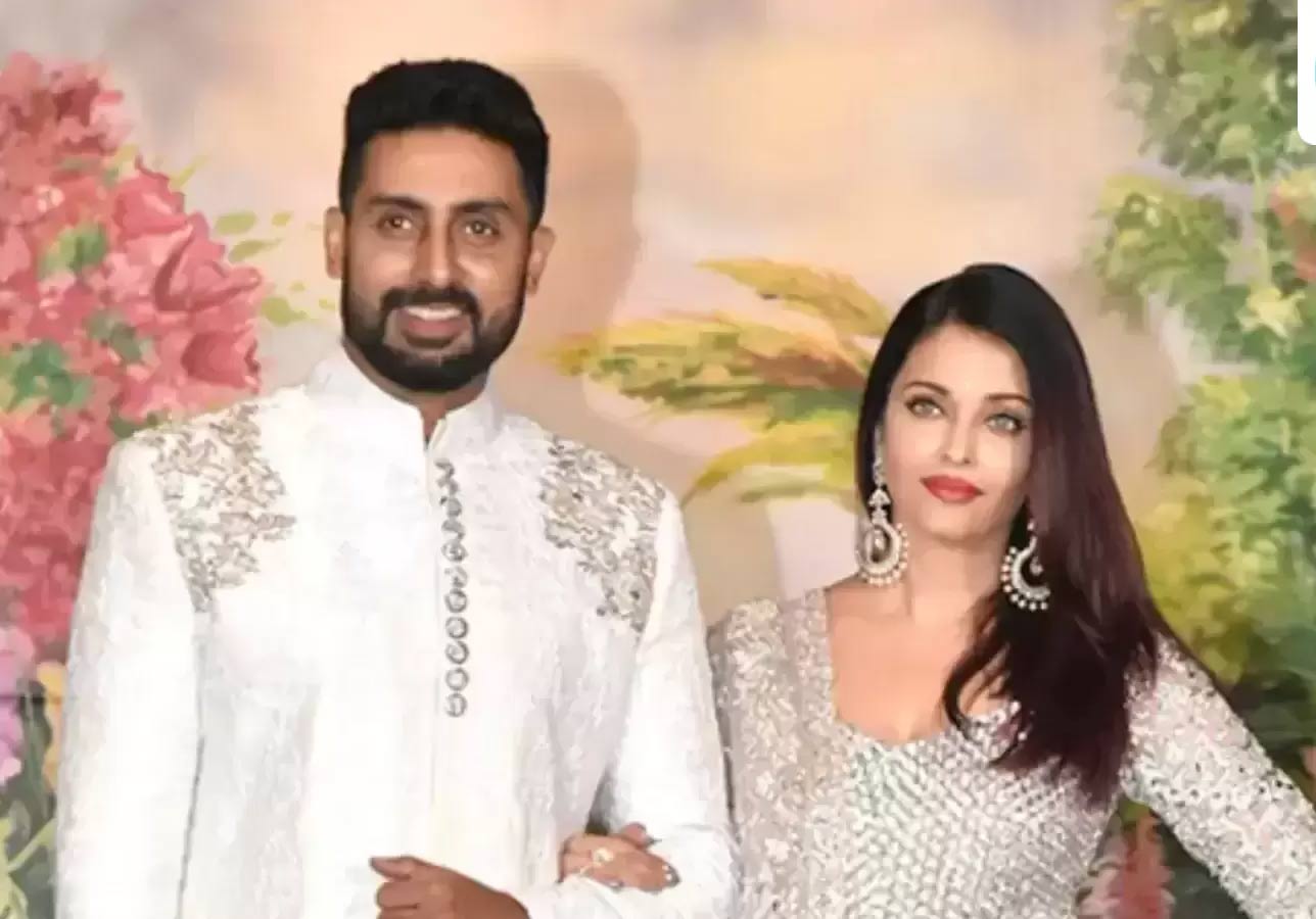 abhishek bachchan  భార్య ముందు వెన‌క్కి త‌గ్గిన హీరో!