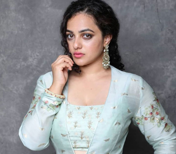 nithya menen,acting,heroine,actress,interest,reading,heroine nithya menen  నటిని అవ్వాలని అనుకోలేదంటున్న నిత్యా..!