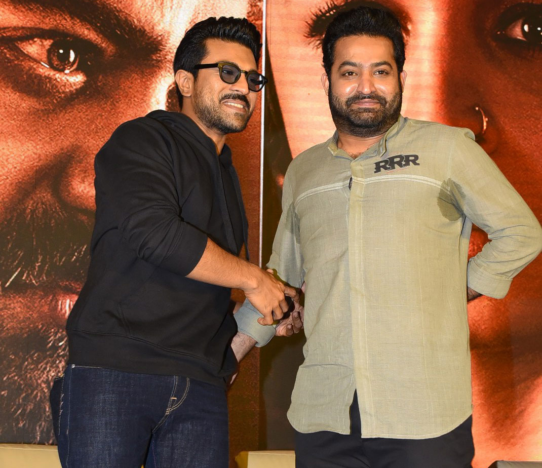 rrr,rrr hyderabad press meet,rrr press meet highlights,ntr,tarak,ram charan,rajamouli  రామ్ చరణ్ సైలెంట్.. ఎన్టీఆర్ వైలెంట్