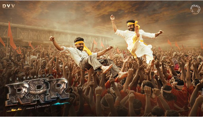 rrr movie,rajamouli rr,ntr rrr movie,ram charan rrr movie,rrr ugadi special poster,ntr - ram charan,jakkanna,rrr ugadi special  ఫాన్స్ లో జోష్ పుట్టించిన RRR పోస్టర్ 